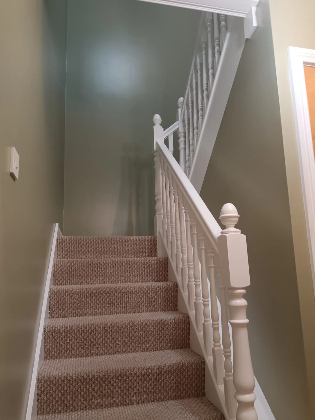 Staircase after painting and renovation in Castlerock by Swanson Decor